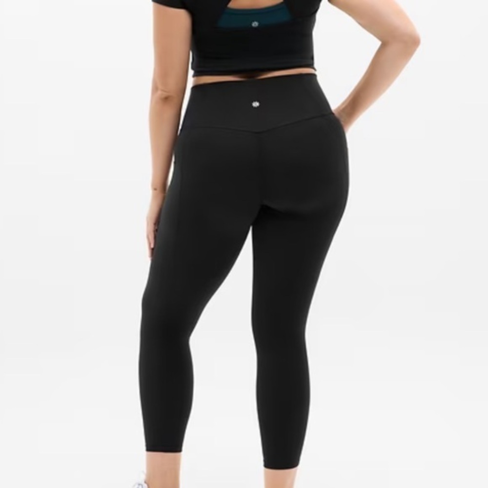 Athleta stash tight leggings avec pouches dissimules salutation